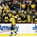 The Michigan bench celebrates after a goal in the second period of the game against Michigan State at Joe Louis Arena on Saturday, Feb. 2. Michigan won 5-2. Daniel Brenner I AnnArbor.com